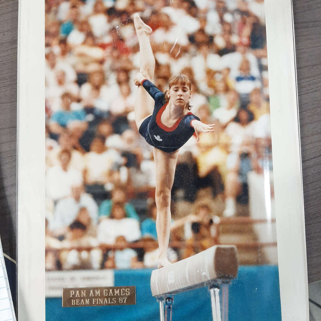Ildiko Inglis, Gymworld Owner, performing her beam routine at Pan-Am Games Beam Finals in 1987